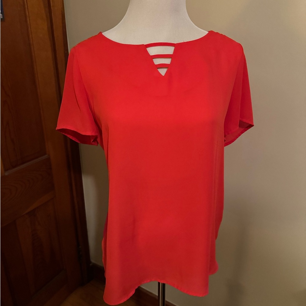 Orange shortsleeve top